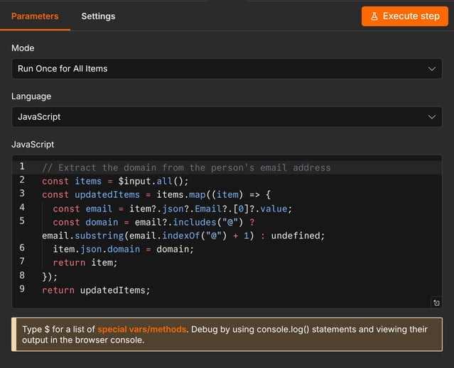 The Code node with JavaScript that extracts the domain from the email address